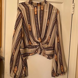 Gorgeous blouse. Never worn but no tags 1XL